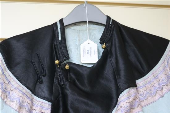 A Chinese embroidered silk robe, eau de nil ground, late Qing